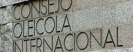 Text on a stone wall reading 'Consejo Oleícola Internacional' in capital letters. - Olive Oil Times
