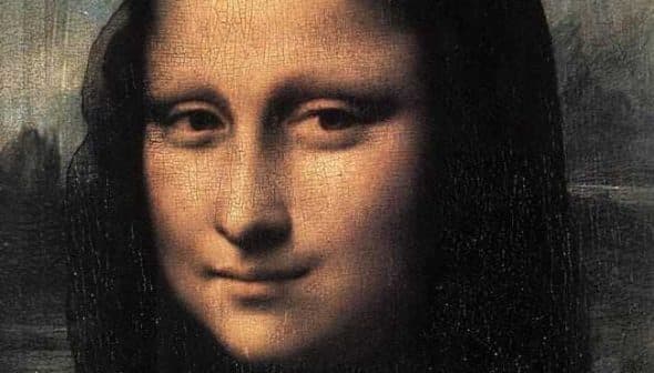 Close-up of the Mona Lisa painting, featuring a woman with a subtle smile and dark hair. - Olive Oil Times