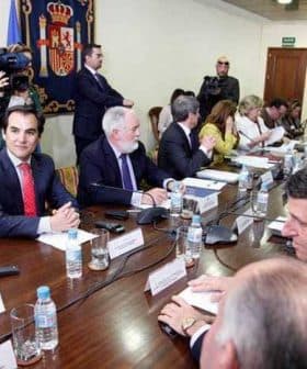A group of government officials seated around a conference table during a meeting. - Olive Oil Times