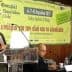 Speaker presenting at a conference about olive oil and olive cultivation with an audience in attendance. - Olive Oil Times