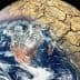 Image of Earth showing cracked land surface and visible water bodies from space. - Olive Oil Times