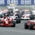 Several Formula 1 race cars competing on a track during a race event. - Olive Oil Times