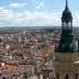 Aerial view of Zaragoza city featuring a prominent tower with a green dome. - Olive Oil Times