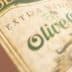 Close-up of an olive oil bottle label featuring the text 'Extra Virgin Olive Oil'. - Olive Oil Times