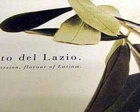 An olive branch with the text 'il gusto del Lazio' and a description of flavors and passion. - Olive Oil Times