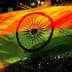 Artistic depiction of the Indian flag with orange, white, and green colors and a navy blue Ashoka Chakra. - Olive Oil Times