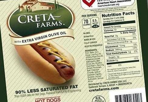 Package of Creta Farms hot dogs featuring extra virgin olive oil and nutrition facts. - Olive Oil Times