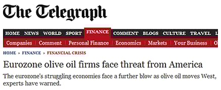 Header of The Telegraph article discussing threats to Eurozone olive oil firms from America. - Olive Oil Times
