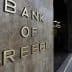 Sign with the words 'Bank of Greece' displayed on a building exterior. - Olive Oil Times