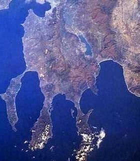 Aerial image showing the Chalkidiki Peninsula with water and land formations. - Olive Oil Times