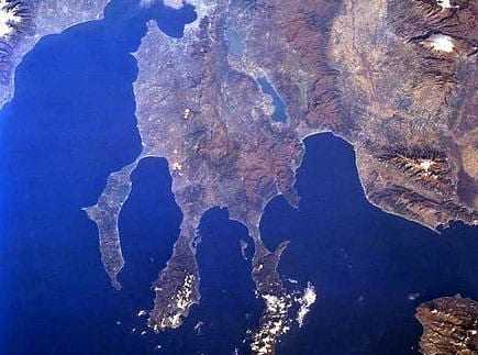 Aerial image showing the Chalkidiki Peninsula with water and land formations. - Olive Oil Times