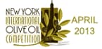 Logo for the New York International Olive Oil Competition featuring olive branches and a skyline. - Olive Oil Times