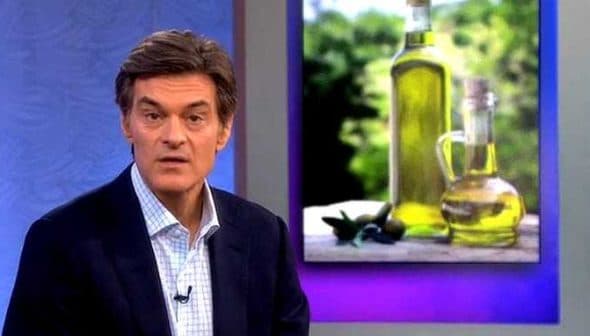 Dr. Oz speaking with olive oil bottles displayed in the background during a television segment. - Olive Oil Times