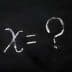 Chalkboard with the equation 'x = ?' written in white chalk. - Olive Oil Times