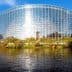 Modern glass structure of the European Parliament building located in Strasbourg, France, reflecting sunlight. - Olive Oil Times
