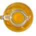 A glass cruet filled with yellow olive oil viewed from above. - Olive Oil Times