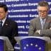 Two men standing at podiums during a press conference at the European Commission. - Olive Oil Times