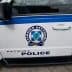 Side view of a Greek police vehicle showing the police logo and text. - Olive Oil Times