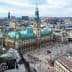 Aerial view of Hamburg City Hall with surrounding buildings and streets in the city. - Olive Oil Times