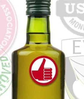 Glass bottle of olive oil featuring certification seals including USDA and California Olive Oil. - Olive Oil Times