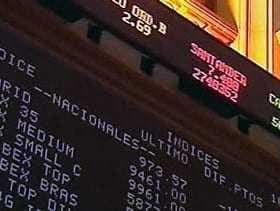 Digital stock market ticker displaying various indices and their values. - Olive Oil Times