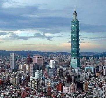 Taipei 101 skyscraper standing tall among the cityscape of Taipei, Taiwan. - Olive Oil Times