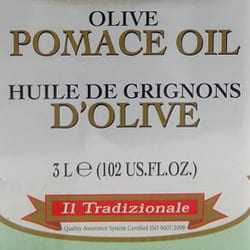 Label of olive pomace oil bottle indicating volume and brand information. - Olive Oil Times