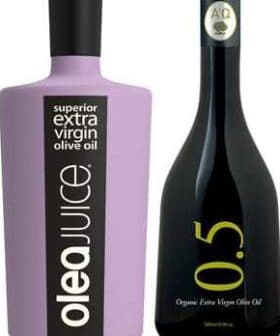 Two bottles of extra virgin olive oil, one with a purple label and the other with a black label. - Olive Oil Times