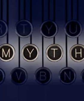 Close-up of typewriter keys with the letters M, Y, T, H highlighted against a dark background. - Olive Oil Times