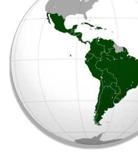 Map highlighting the countries of Latin America in green on a globe. - Olive Oil Times