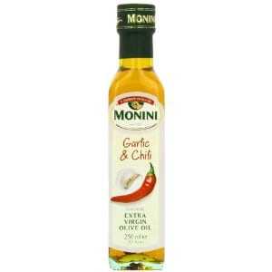 Bottle of Monini Garlic and Chili Extra Virgin Olive Oil with a red chili pepper design. - Olive Oil Times