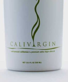 Bottle of Calivargin premium extra virgin olive oil with a white label and green logo. - Olive Oil Times