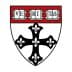Coat of arms of Harvard University featuring a black cross and the word 'Veritas'. - Olive Oil Times