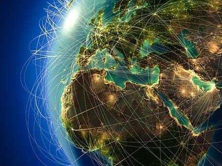 Illustration of Earth with glowing network connections over Europe and Africa. - Olive Oil Times