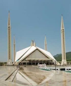 Faisal Mosque in Islamabad with four tall minarets and a large triangular roof structure. - Olive Oil Times