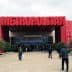Entrance of the Metropolitan Exhibition Center with a large red sign above the doors. - Olive Oil Times