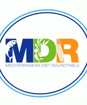 Logo of the Mediterranean Diet Roundtable featuring the letters MDR in colorful design. - Olive Oil Times
