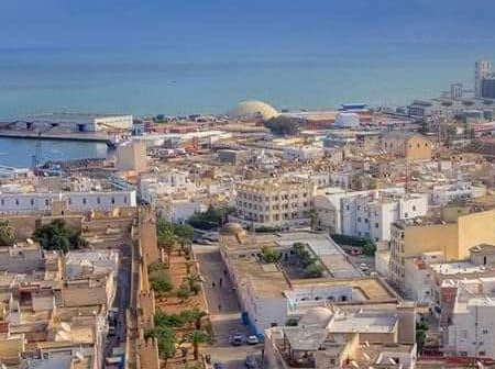 Aerial view of Sousse, Tunisia, showcasing buildings and coastal area. - Olive Oil Times
