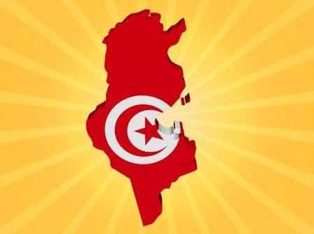 Silhouette of Tunisia filled with the national flag colors on a yellow background. - Olive Oil Times