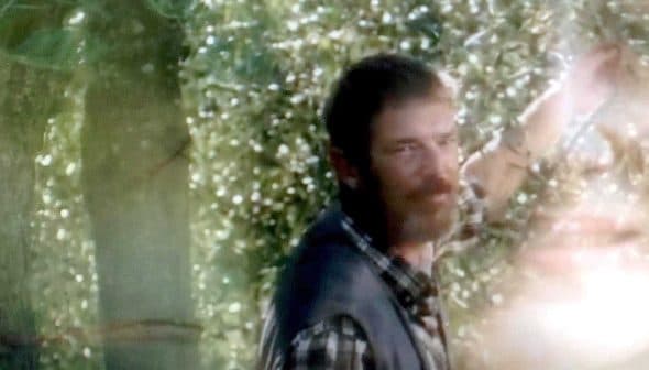 A man with a beard and a woman smiling, both appearing in a natural outdoor setting. - Olive Oil Times