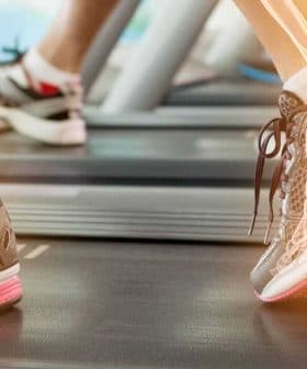 Anatomical illustration of feet in running shoes on a treadmill showing bone structure and movement. - Olive Oil Times