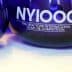 Blue glass awards for the New York International Olive Oil Competition with the text 'NYIOOC'. - Olive Oil Times