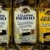 Three bottles of Filippo Berio olive oil labeled 'Mild & Light' and 'Olive Oil' on a shelf. - Olive Oil Times