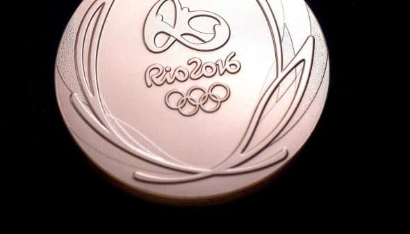 Bronze medal from the Rio 2016 Olympics featuring Olympic rings and logo. - Olive Oil Times