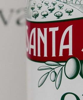 Label of Santa Sabina olive oil featuring olive illustrations and text. - Olive Oil Times