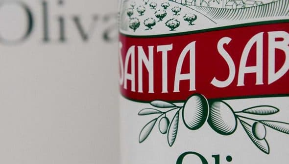Label of Santa Sabina olive oil featuring olive illustrations and text. - Olive Oil Times