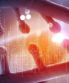 A digital illustration of a DNA double helix with binary code overlay. - Olive Oil Times