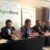 Panel of six individuals seated at a table during an AgroBank press conference. - Olive Oil Times