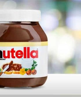 Jar of Nutella hazelnut spread with a white lid and label featuring the brand name and logo. - Olive Oil Times