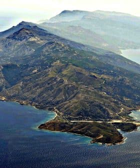 Aerial view of Ikaria Island showing mountainous terrain and coastal features. - Olive Oil Times